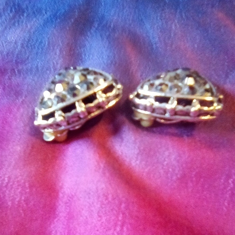 Silver Tone Triangle Shaped Clip On Earrings with Metallic Rhinestone Accents. - Picture 3 of 7